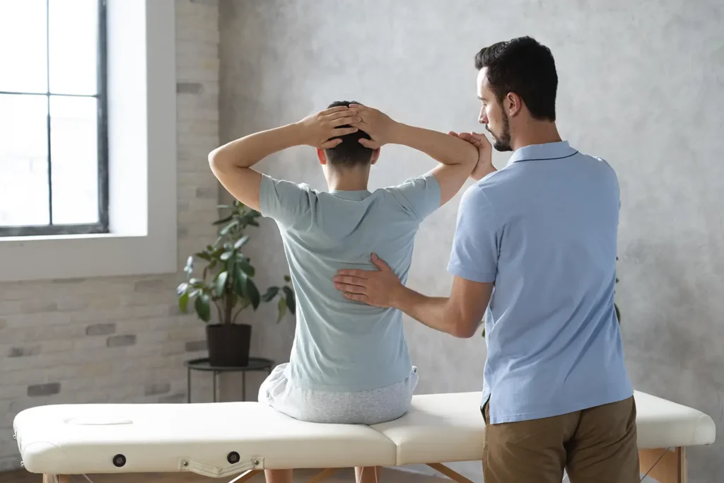 Rubicare Health Savings Plan Chiropractic provider adjusting a patient's back.